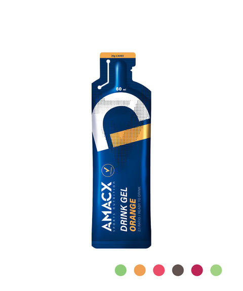 A blue packet labeled "Amacx Drink Gel Orange" with 60 ml content, emphasizes its role as a nutrition product for athletes. The packet includes a yellow top tab and features four color circles in green, orange, red, and brown at the bottom right corner. It offers an optimal carbohydrate ratio to effectively replenish energy during sports activities.