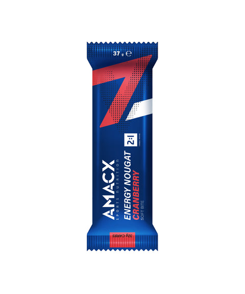 A blue and red energy nougat bar with the brand name "Amacx.com" and the flavor "Cranberry" displayed on the wrapper. Weighing 37 grams, it offers a soft bite texture. The packaging features a large number 7 design along with product details, making it an essential part of the Amacx Endurance Bundle to boost your energy levels.